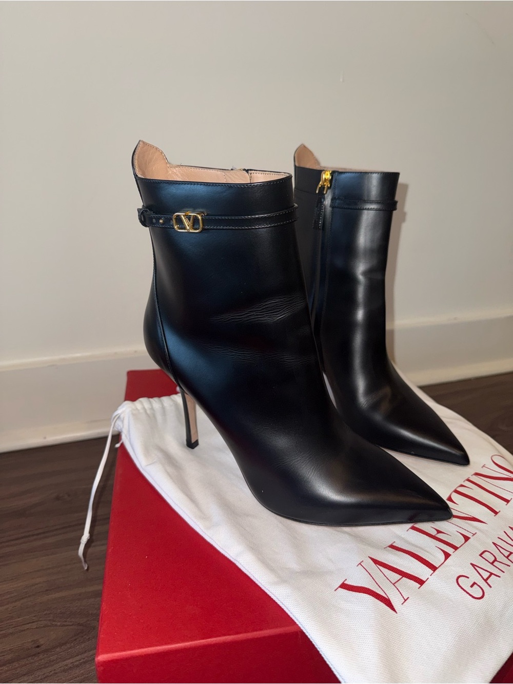 Valentino Garavani Black Leather Pointed Stiletto Ankle Boots with Gold Accent